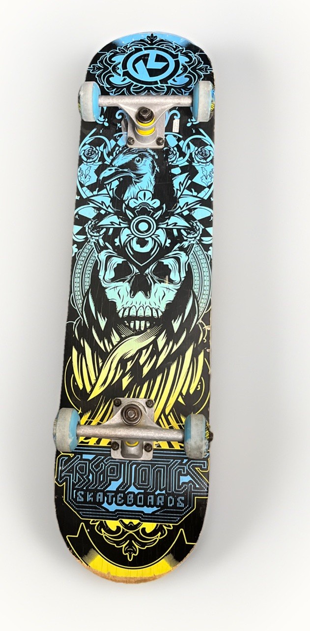 Kryptonics Bravo Sports Skateboard Featuring A Skull Topped With Raven Headdress