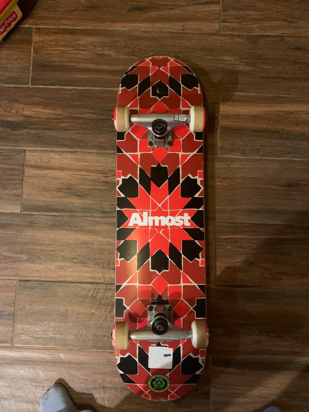 skateboard complete 7.75 red tile