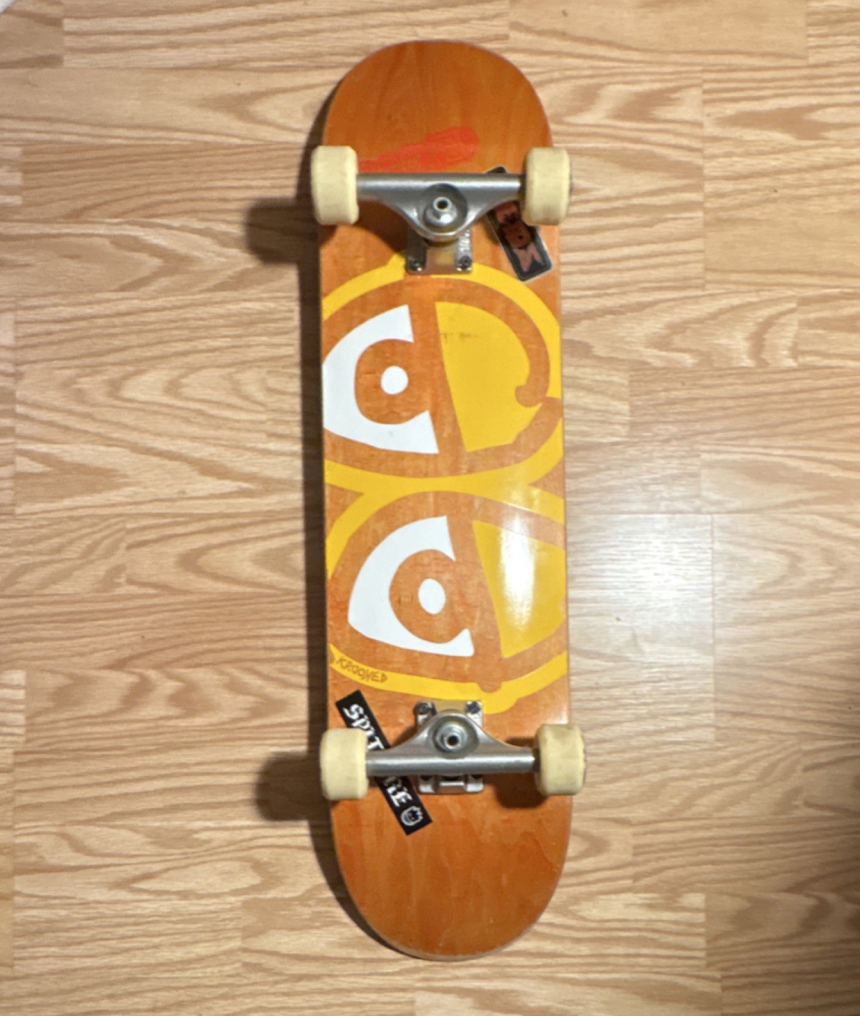 Krooked Skateboard Orange Yellow Eyes Graphic Spitfire Wheels Independent Trucks